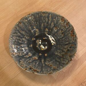 Cobalt blue and gold glazed pottery bowl